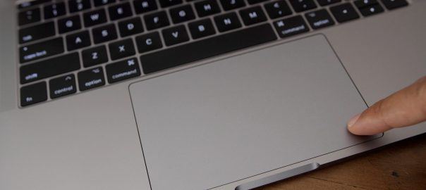 What can the Drive Contact trackpad do on a Mac?