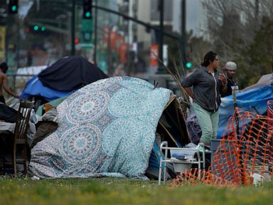 California rushes to prevent virus spread among the homeless