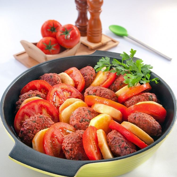 The tray of kofta with potato and tomato