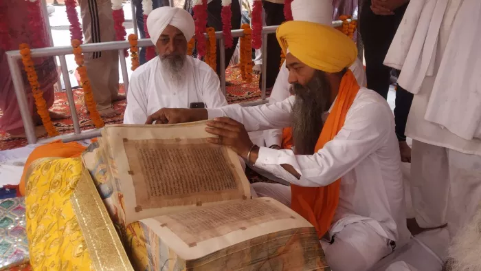 Enthusiasm among dedicates about Baisakhi, the first handwritten Adi Sri Guru Granth Sahib in Kartarpur – Kartarpur News Devotes Happy