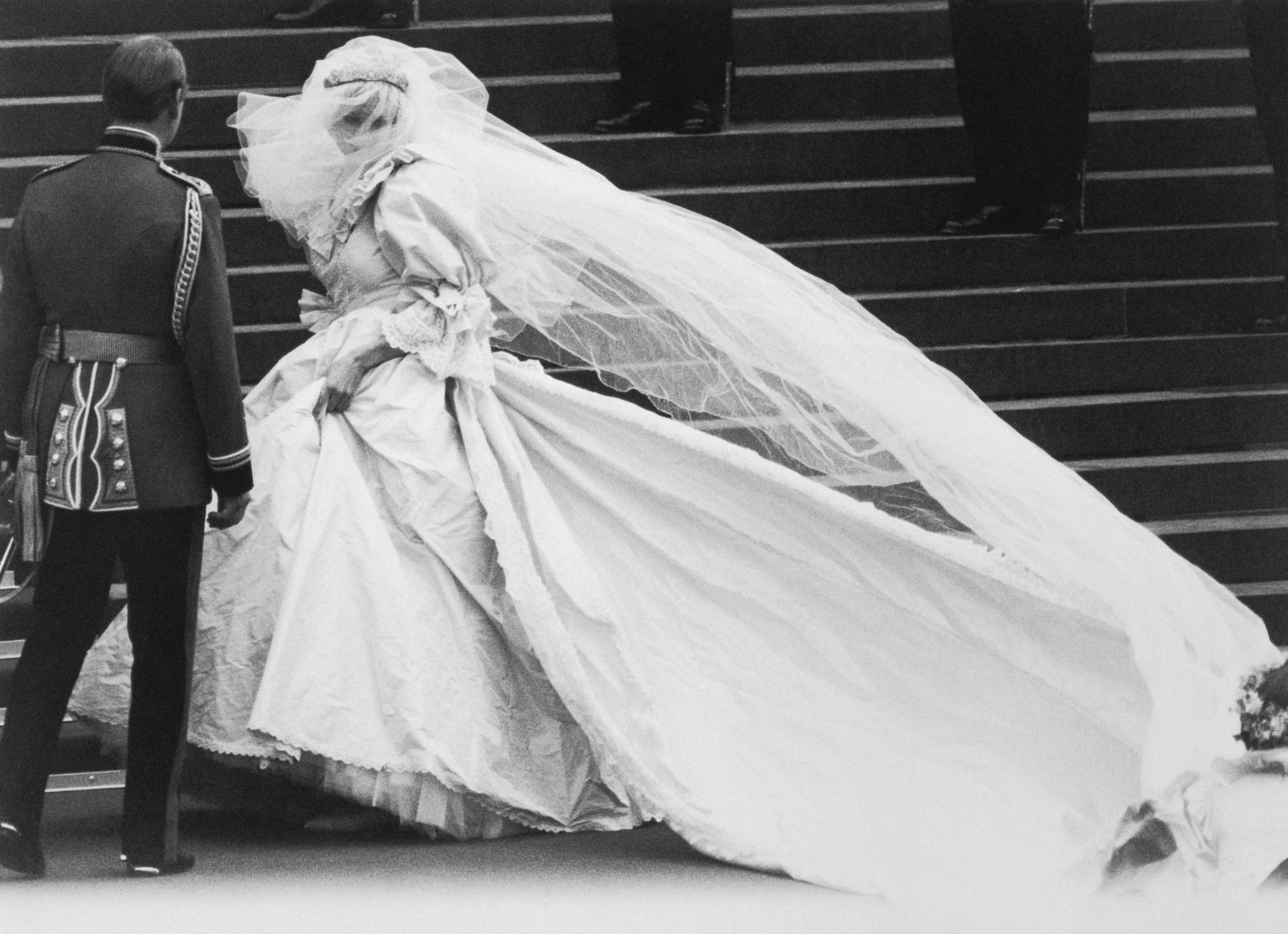 Lady Diana Spencer arrives at St. Paul's Cathedral on her wedding day, revealing to the world the wedding dress which had been carefully guarded during its design.