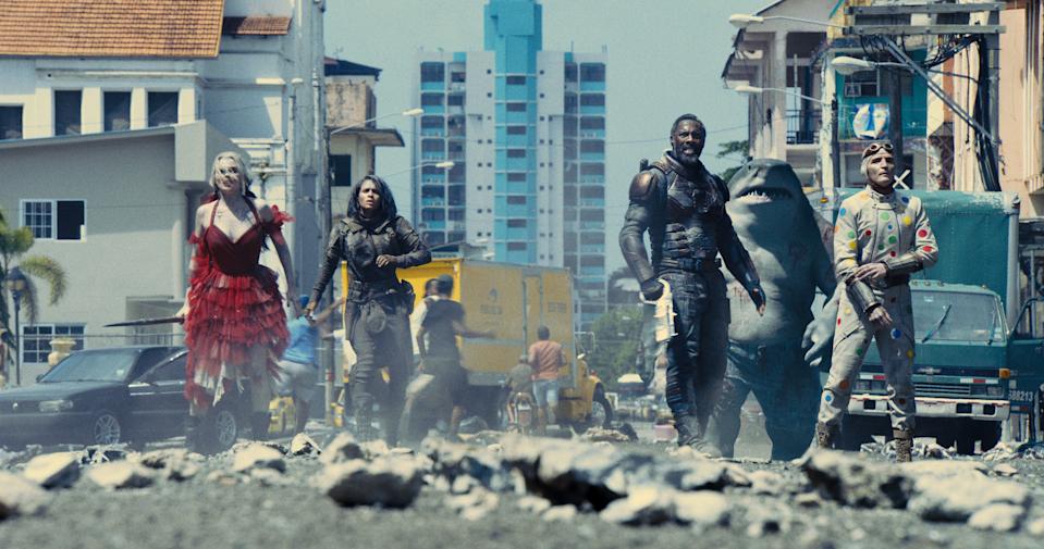 Margot Robbie, Daniela Melchior, Idris Elba, Sylvester Stallone and David Dastmalchian star in The Suicide Squad. (Still: Warner Bros)
